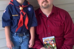 Dad-posing-with-young-Cub-Scout-son-in-uniform